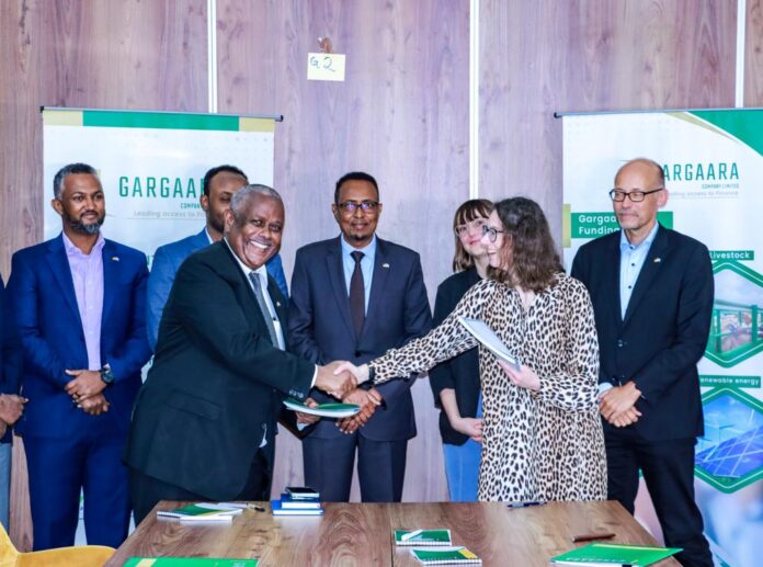 Grant agreement between Germany Dev Bank and Gargaara in Mogadishu.