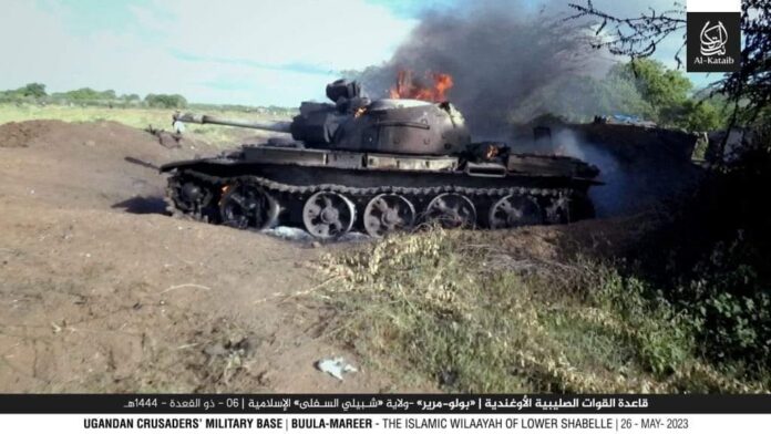 Al-Shabaab released photo shows a military tank on fire during Friday's attack on Ugandan army base in Buulo Mareer town.