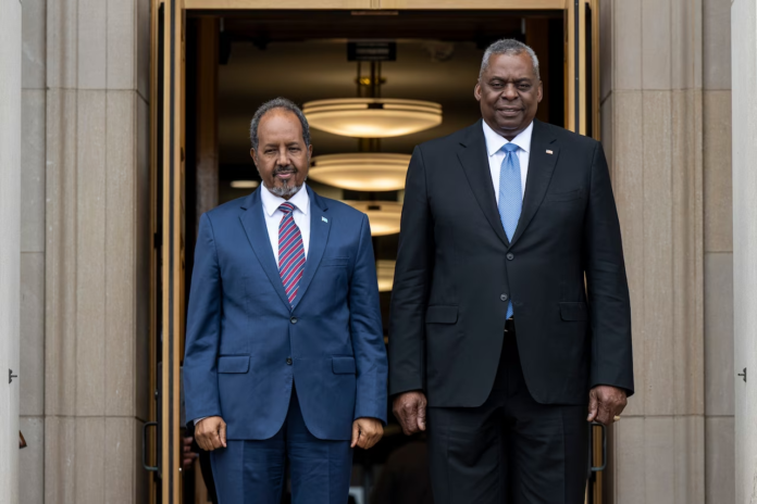 Secretary of Defense Lloyd J. Austin III poses for a photo with Somali President Hassan Sheikh Mohamud before a meeting at the Pentagon, June 21, 2023. | PHOTO Credit/ Pentagon.