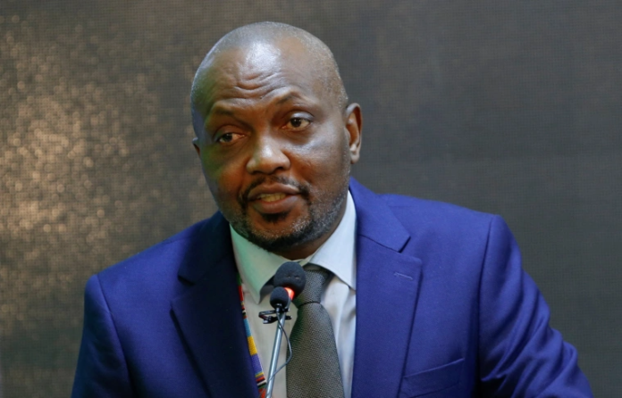 Kenyan Cabinet Secretary for Trade and Industry Moses Kuria addresses delegates in Nairobi on June 14, 2023.