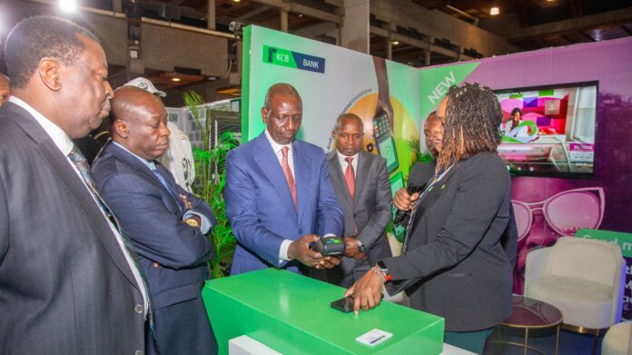 William Ruto (pictured) assessing the new digital ID system at the KICC in Nairobi on Friday.