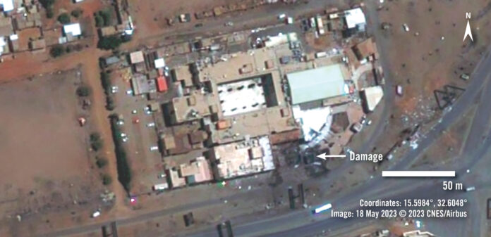 Satellite imagery of Sharq al-Nil hospital, showing damage to the south side of the building. | PHOTO © 2023 CNES/Airbus.