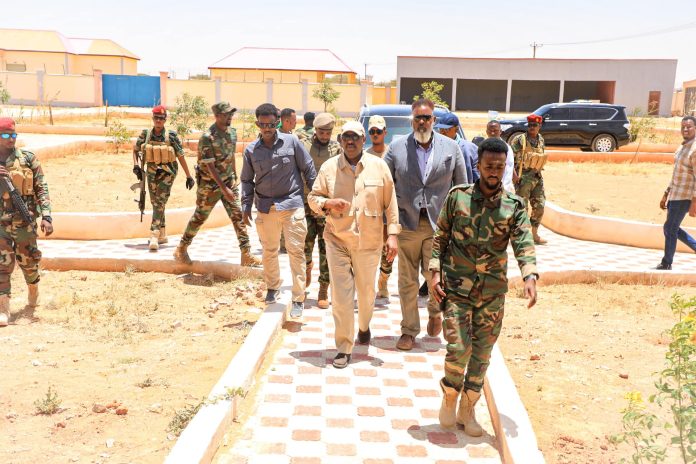 Puntland president, Said Abdullahi Deni (centre) during a visit to Qardho on 12 August 2023.