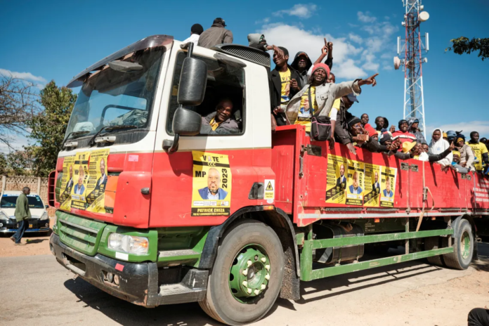 Supporters of Zimbabwe's main opposition party, the Citizens Coalition for Change (CCC) arrive at an election rally in Gweru, Zimbabwe, July 16, 2023. Zimbabwean reporter Columbus Mavhunga, who has reported on the government crackdown on opposition politicians, has been charged with illegally flying a drone to report on abandoned government road projects .(Reuters/KB Mpofu)