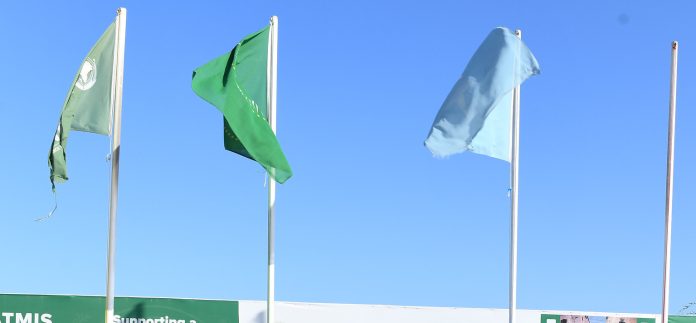 ATMIS and African Union flags alongside the Somali flag.