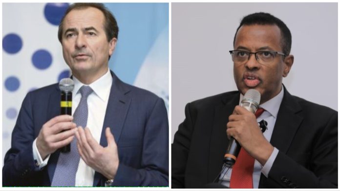 Somalia Central Bank Governor, Abdirahman Mohamed Abdullahi (pictured right) paid over $1.4 to company owned by Russinan oligarchy, Anatoly Igorevich Loginov (pictured left).