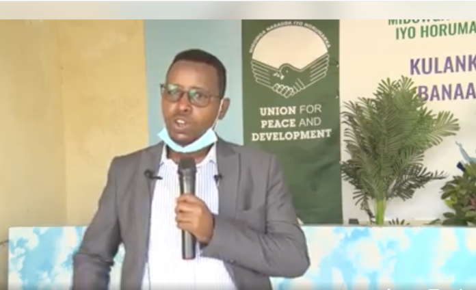 In this photo taken on 24 February 2021, Bashir Moallim Ali Hassan addressing an event within the Union for Peace and Development (UPD) office, a political group headed by President Hassan Sheikh Mohamud.