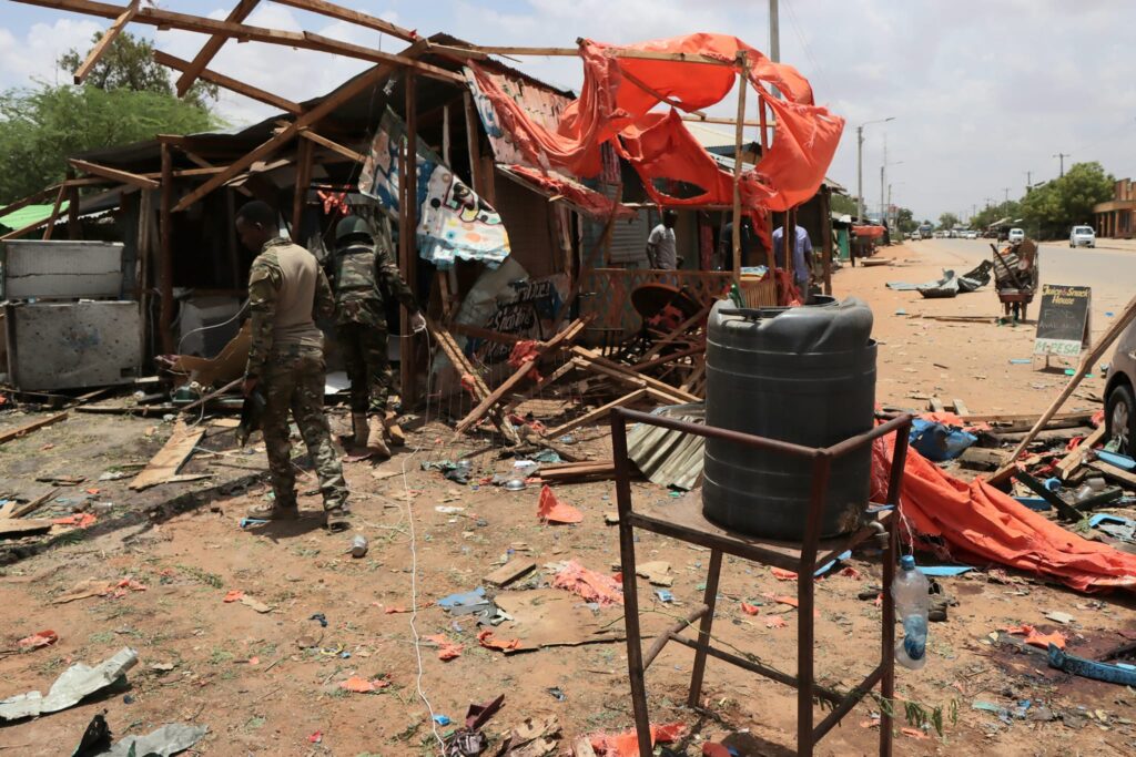 Kenya Defense Forces clear the site of the terror bombing in Mandera. At least 3 were killed and 12 others injured.