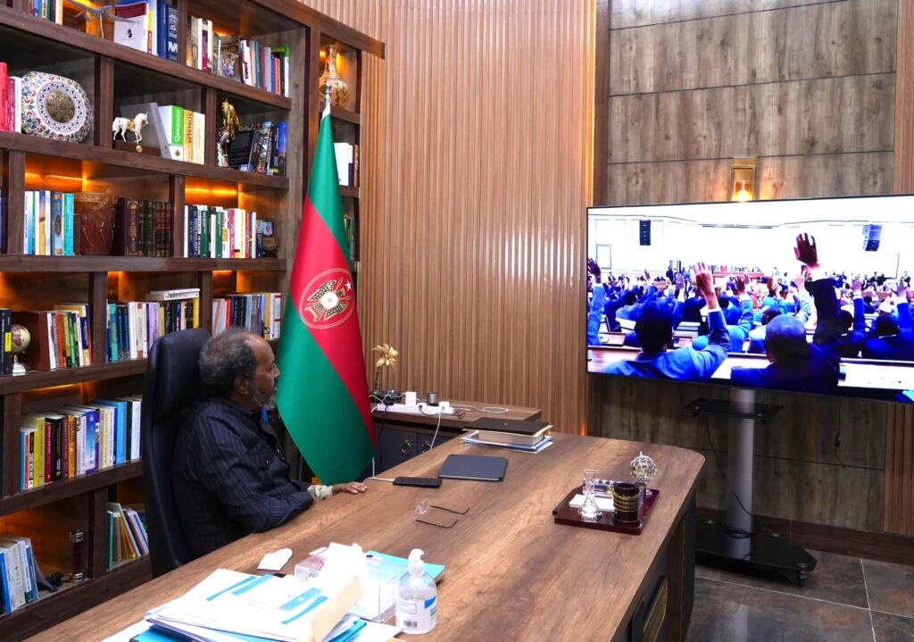 In this photo published by Villa Somalia, Hassan Sheikh Mohamud is seen observing the parliamentary vote via live TV feed on Saturday 31 March, 2024. 