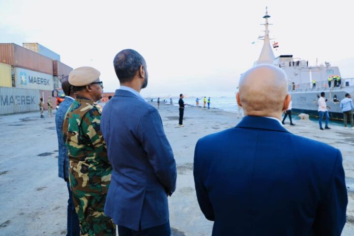 The Somalia Minister of Defense and military officials were seen at the Mogadishu seaport on Monday as an Egyptian ship delivered weapons to the city. | PHOTO/Facebook.